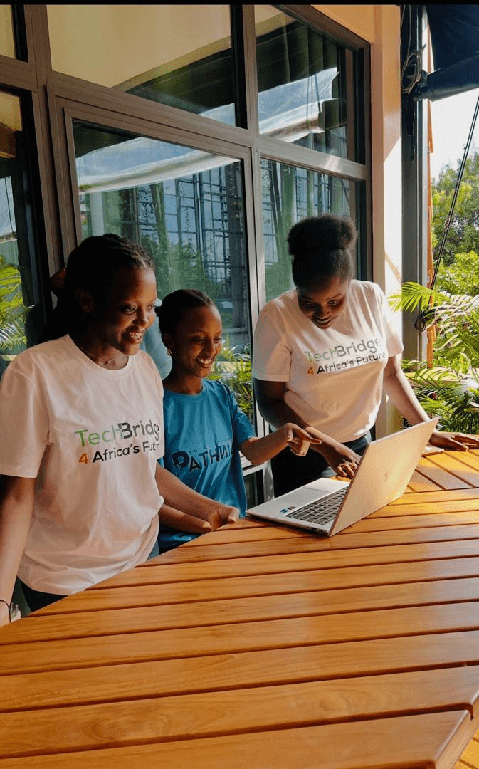 TechBridge for Africa participants working on laptops